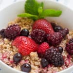 Warm Breakfast Bowl with Mixed Berry Reduction