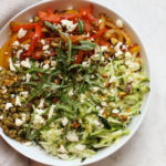 green lentil bowl with pistachio pesto