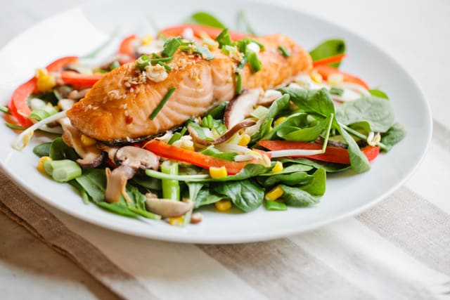sizzling salmon and spinach salad