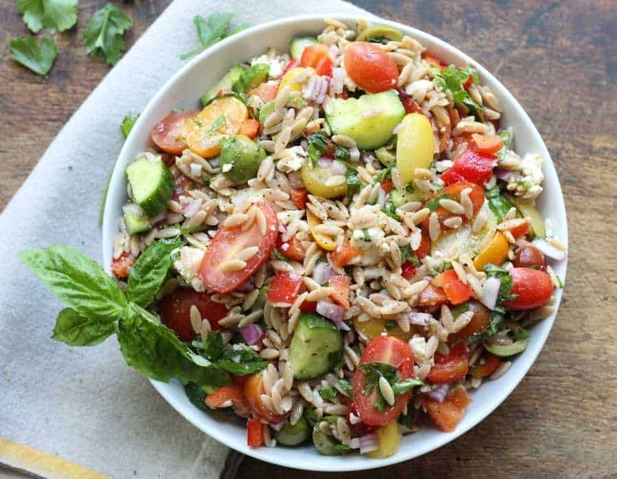 Greek orzo pasta salad with feta in a bowl